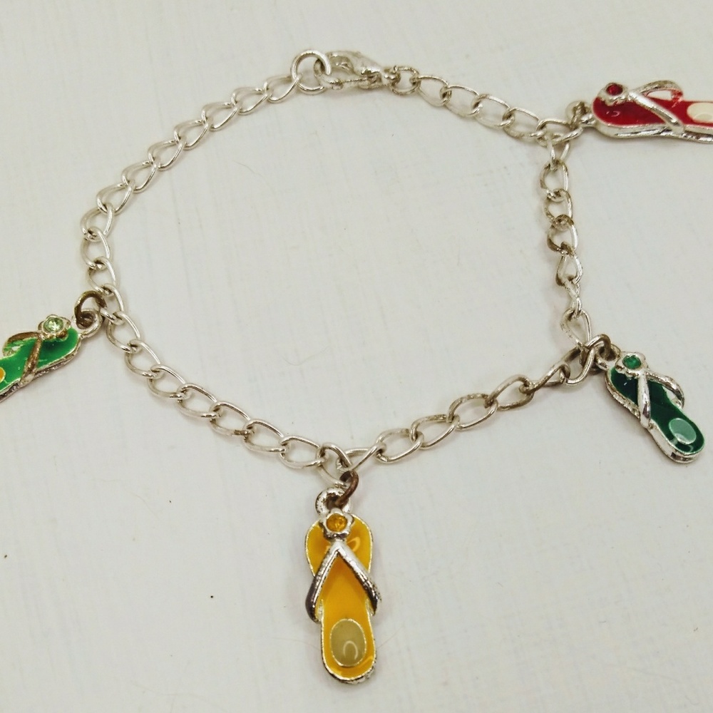 Charm Bracelet, silver tone.